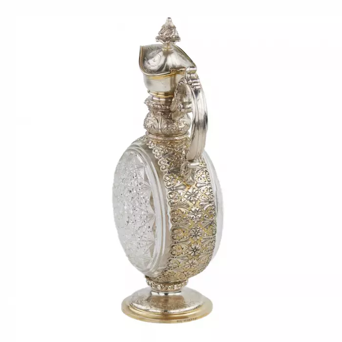 PAIR OF CUT CRYSTAL WINE EWERS WITH SILVER MOUNTS GERMANY, FIRST HALF OF THE 20TH CENTURY
