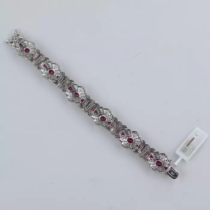 18-KARAT WHITE GOLD BRACELET WITH RUBIES AND DIAMONDS