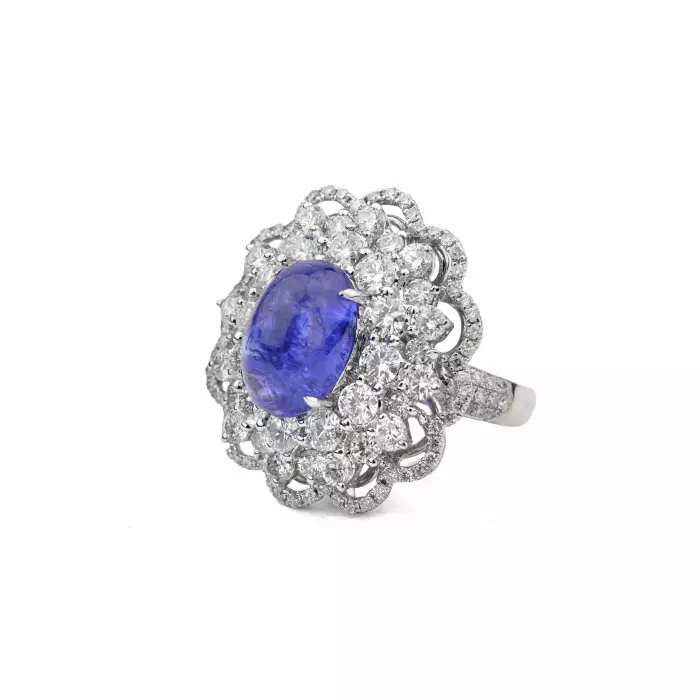 18-KARAT GOLD RING WITH SAPPHIRE AND DIAMONDS
