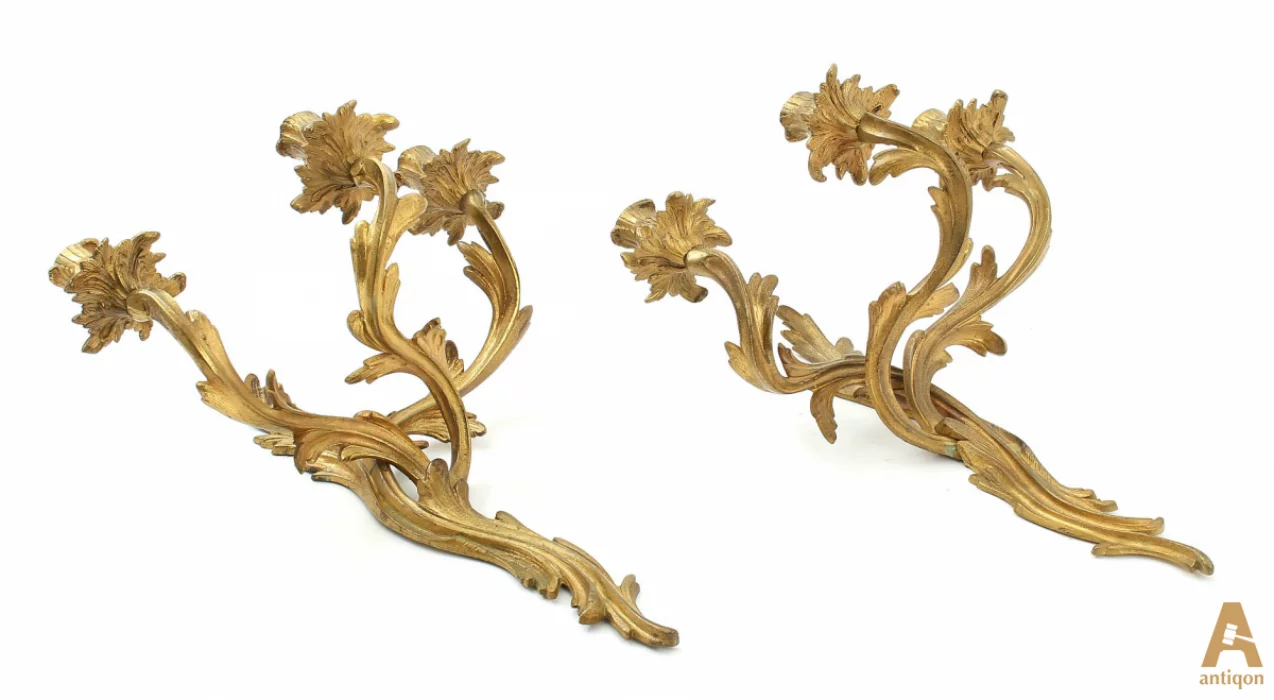 A pair of gilt bronze sconces