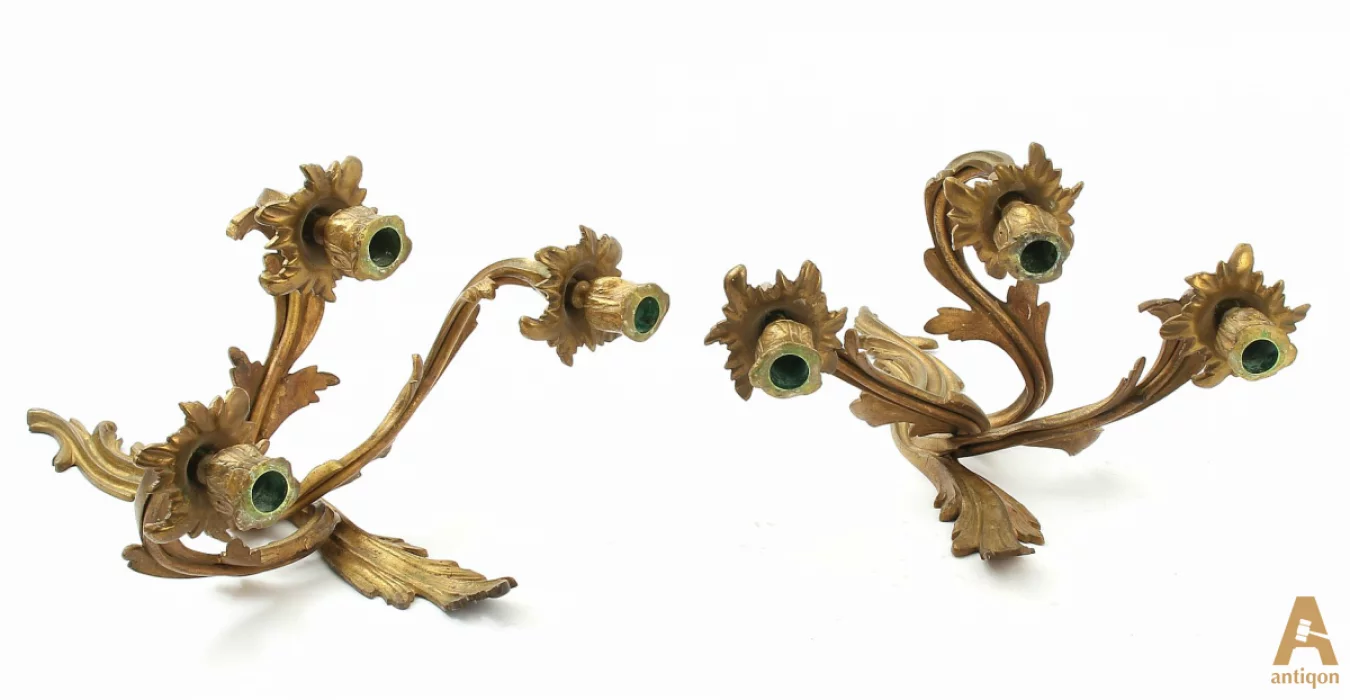 A pair of gilt bronze sconces