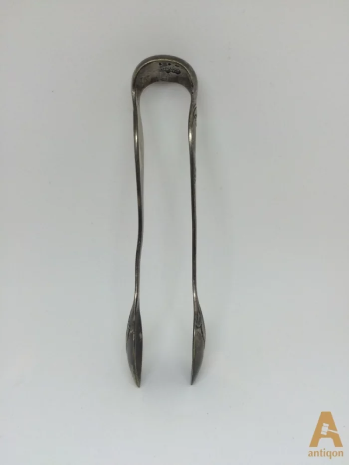 Silver sugar tongs. Warchawa