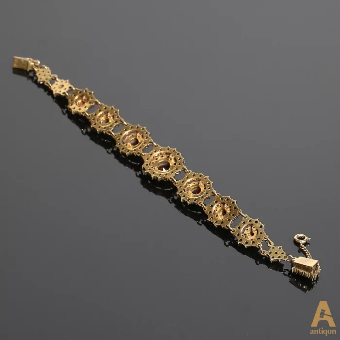 Bracelet with grenades.