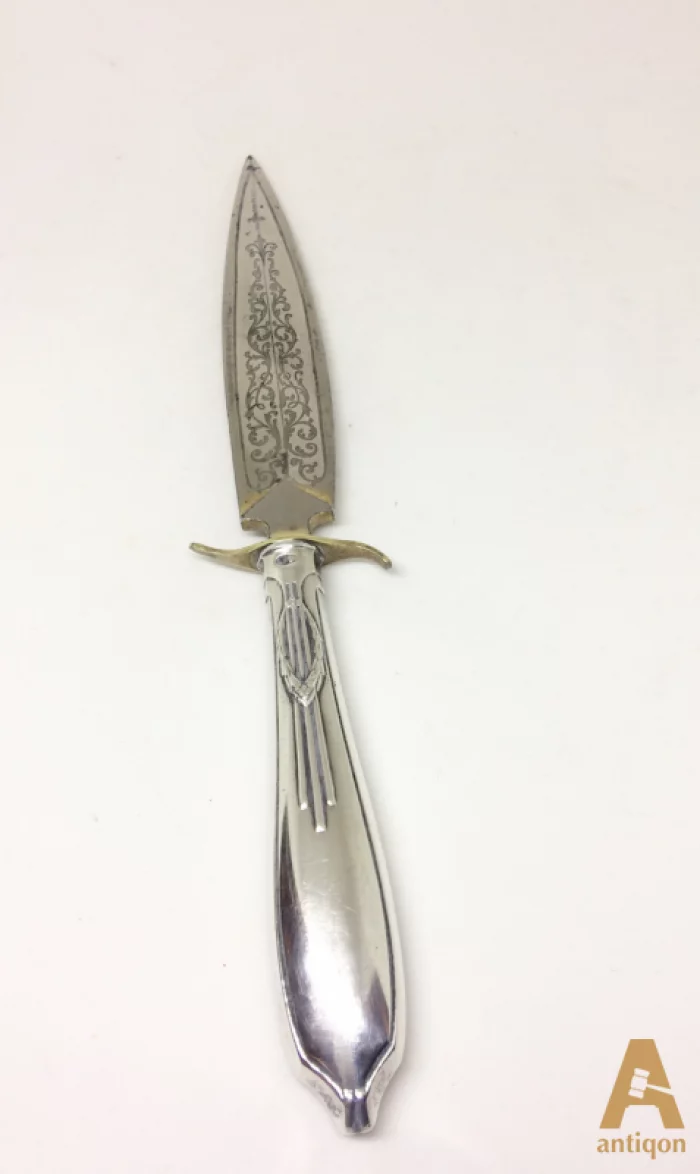 Silver knife for letters.