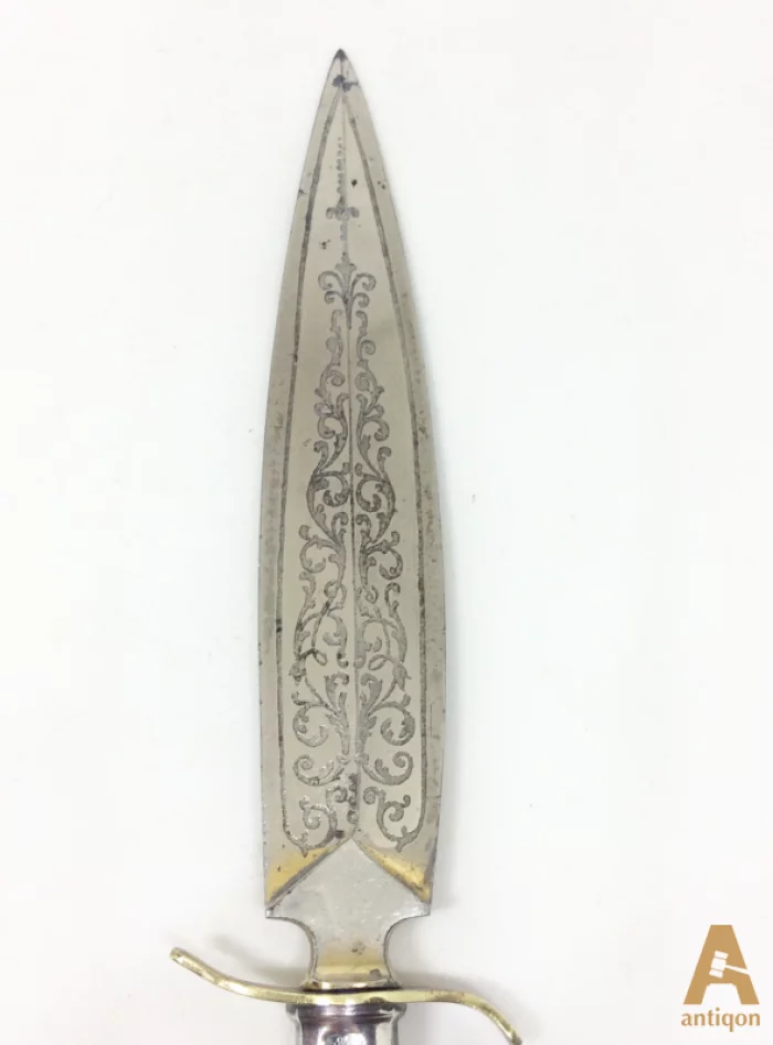 Silver knife for letters.