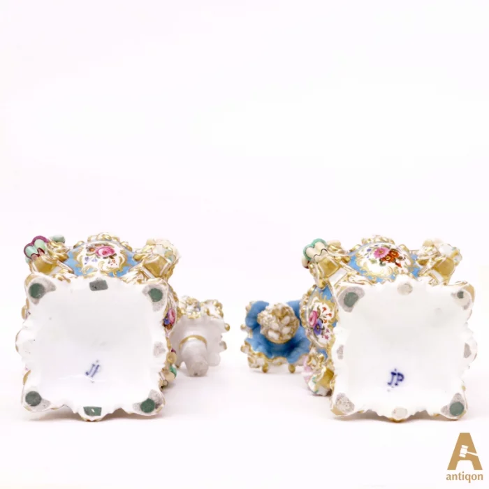 A pair of perfume flacon
