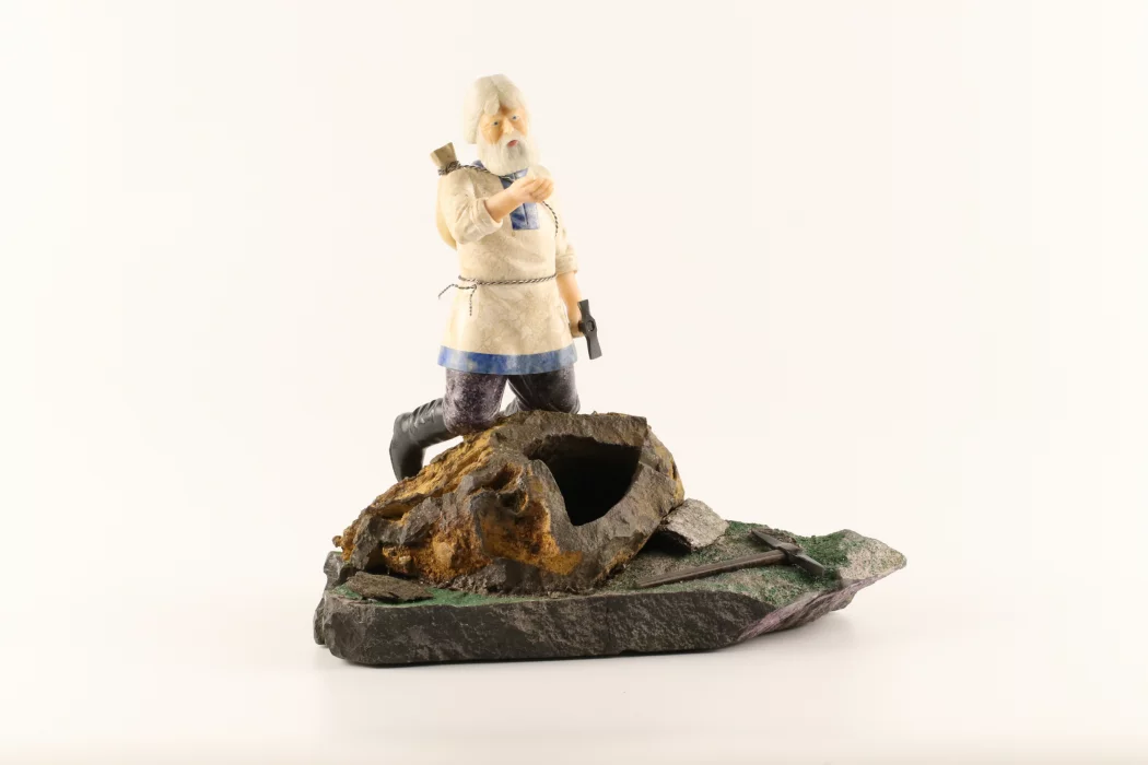 Stone-cut figurine Stone Seeker in Faberge style. 