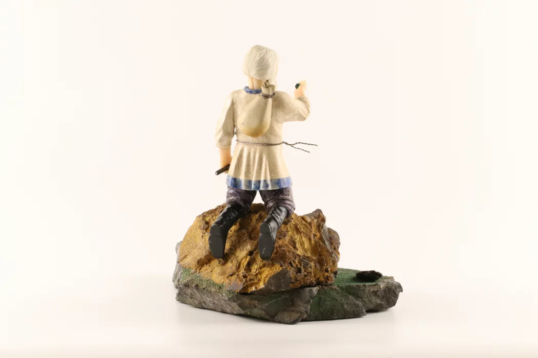 Stone-cut figurine Stone Seeker in Faberge style. 