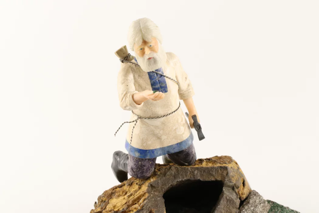 Stone-cut figurine Stone Seeker in Faberge style. 