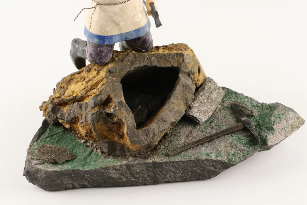 Stone-cut figurine Stone Seeker in Faberge style. 