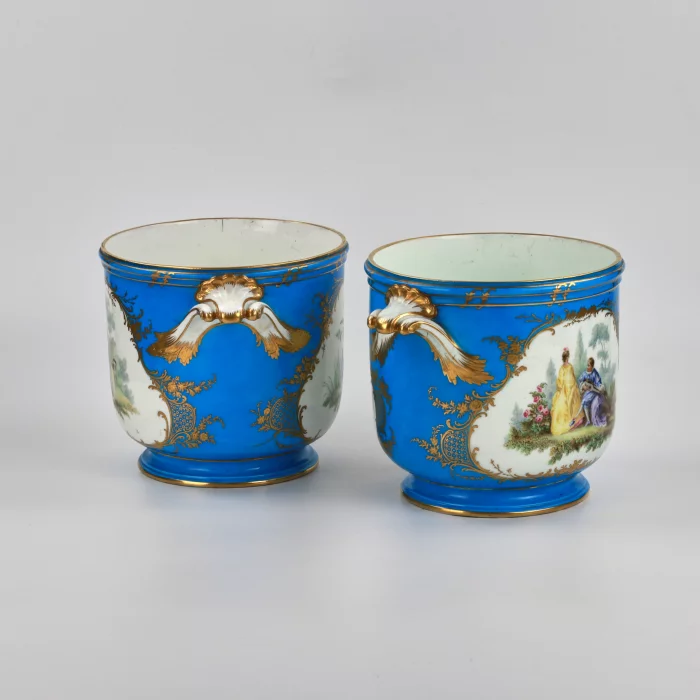 A pair of Sevres cachepots