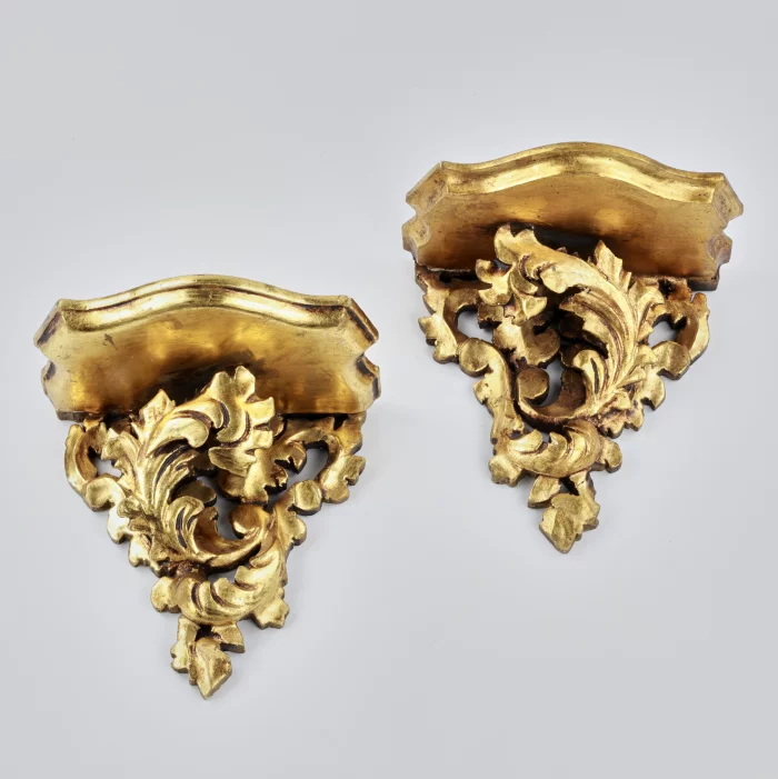 Pair of carved consoles
