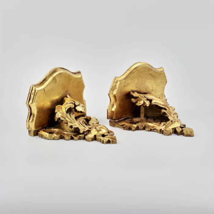 Pair of carved consoles