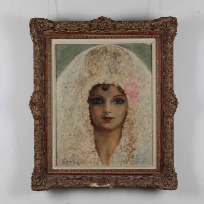Une femme espagnole dans une cape blanche.