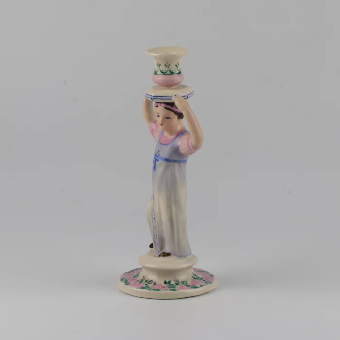 Porcelain candlestick-figure Russian peasant woman.