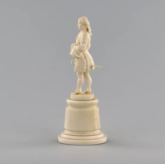 Ivory figure of a gentleman in a cocked hat.