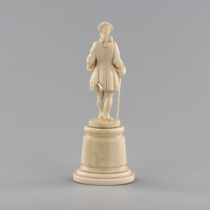 Ivory figure of a gentleman in a cocked hat.