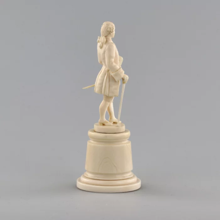 Ivory figure of a gentleman in a cocked hat.