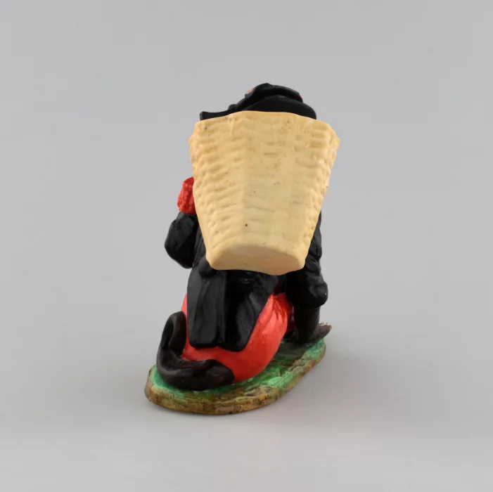 PORCELAIN FIGURE-CONTAINER MONKEY AS NAPOLEON. THURINGIA, GERMANY. LATE 19TH TO EARLY 20TH CENTURY.