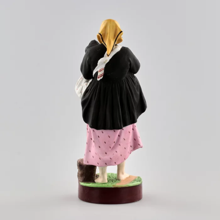 Figurine en porcelaine Part amère. Usine de Gardner du 19e siècle.