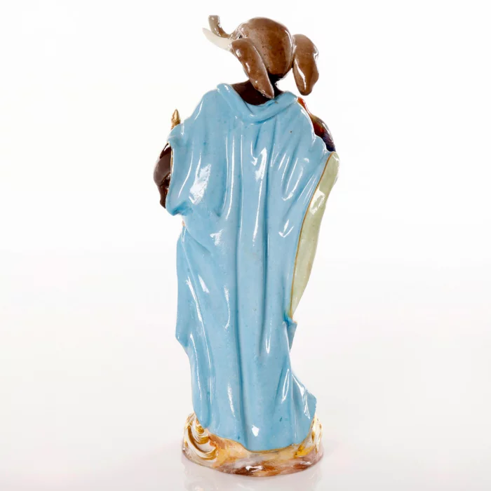 Figurine en porcelaine allegorie 