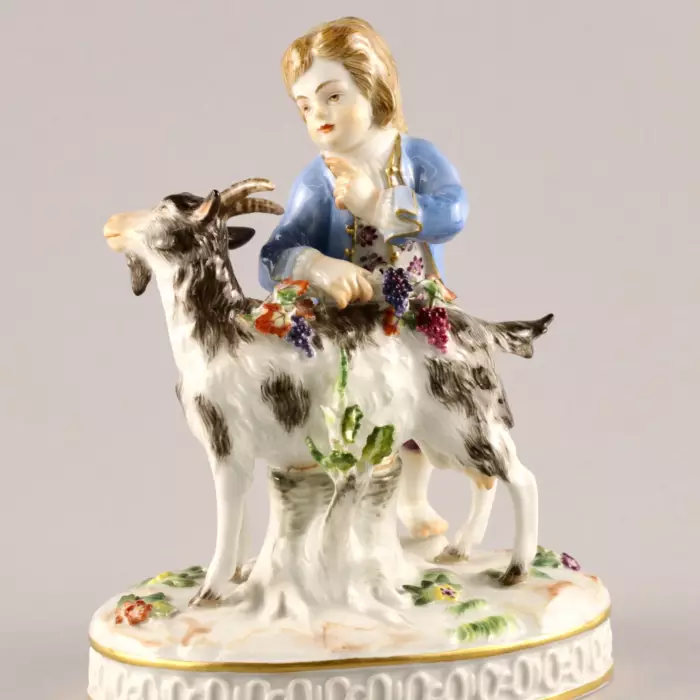 MEISSEN PORCELAIN FIGURE BOY WITH A GOAT. ALLEGORY OF AUTUMN
