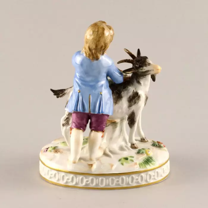 MEISSEN PORCELAIN FIGURE BOY WITH A GOAT. ALLEGORY OF AUTUMN