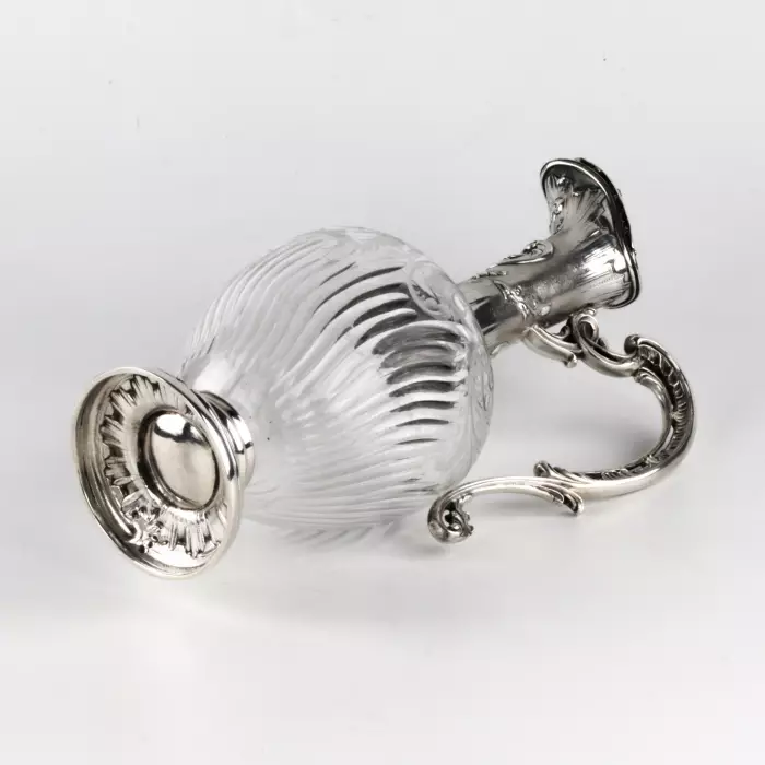 Charming French wine jug made of glass with silver. 