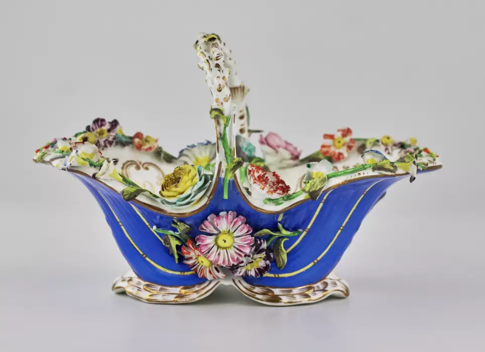 Porcelain basket with floral decor in Rococo style Europe, second half of the 19th century