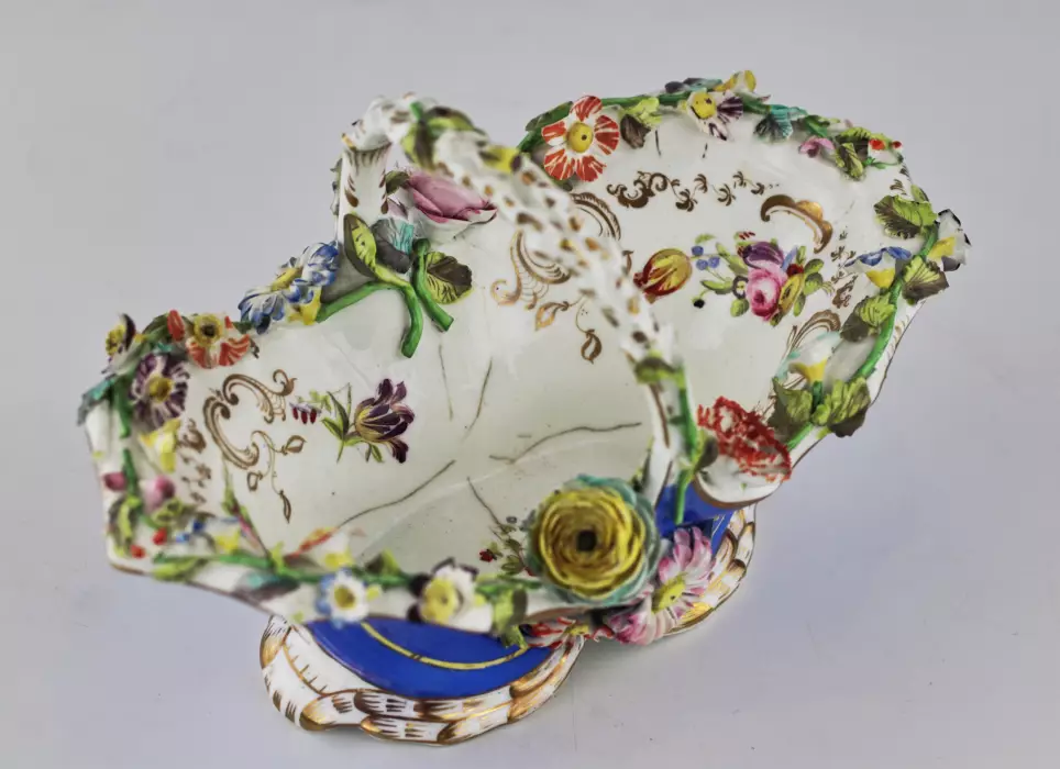 Porcelain basket with floral decor in Rococo style Europe, second half of the 19th century