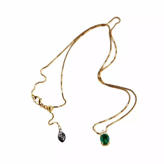 Giorgio Visconti. 18K gold pendant and earrings with emeralds and diamonds.