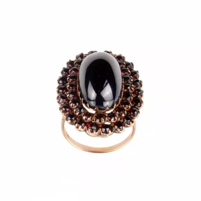 Golden ring with garnets. 
