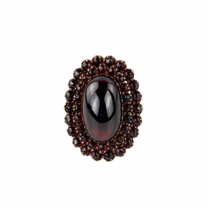 Golden ring with garnets. 