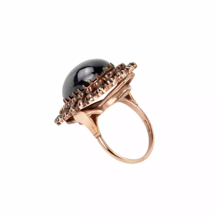 Golden ring with garnets. 