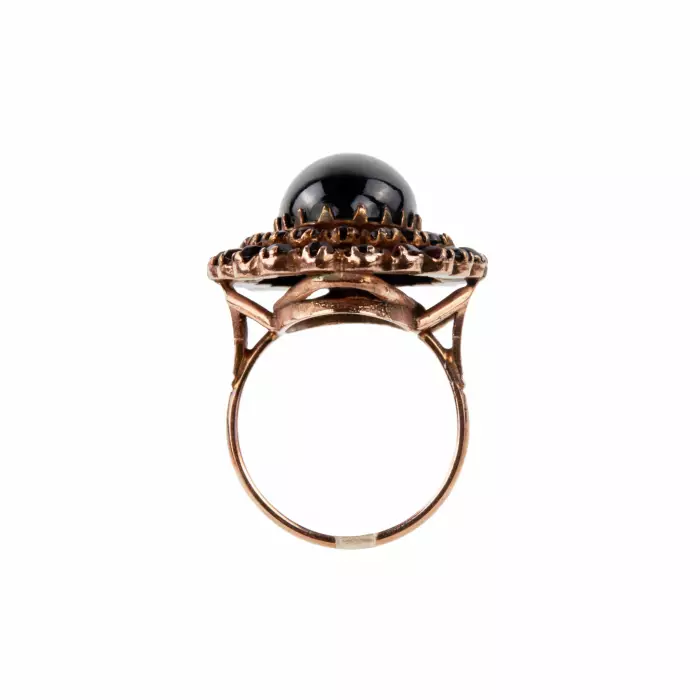 Golden ring with garnets. 