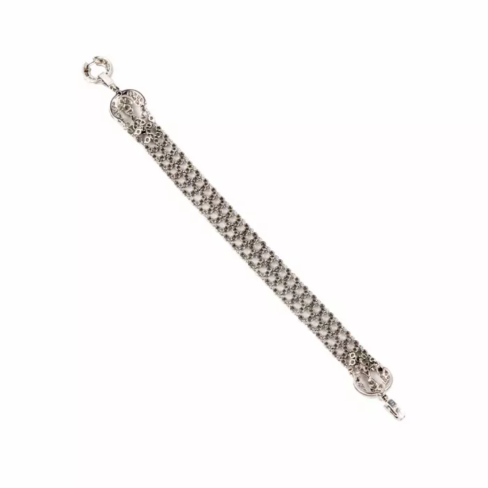 Bracelet elegant en or blanc, en forme de ceinture, avec diamants. 
