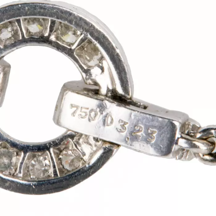 Bracelet elegant en or blanc, en forme de ceinture, avec diamants. 
