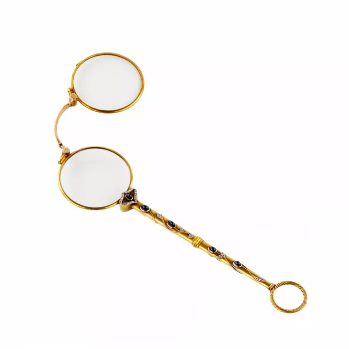 Superbe lorgnette en or valeur de dosage 56 avec pierres precieuses. 