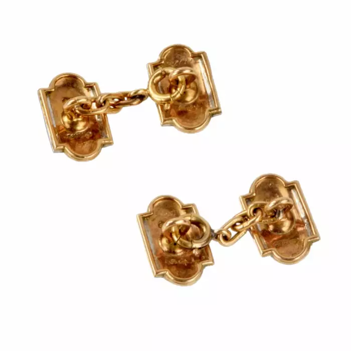 Boutons de manchette Cartier en or avec email et diamants. annees 1920. 