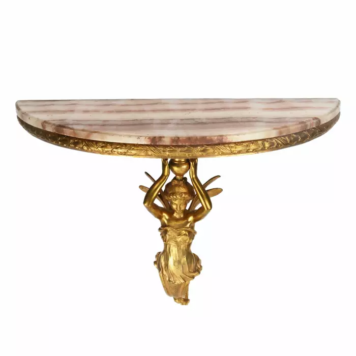 Paire de consoles en bronze dore à ecorce ailee, dans le goût de Napoleon III. 19ème siècle. 