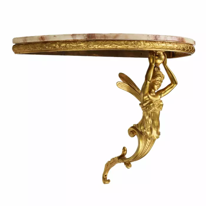 Paire de consoles en bronze dore à ecorce ailee, dans le goût de Napoleon III. 19ème siècle. 