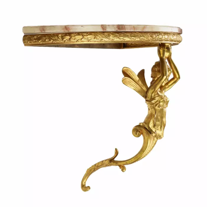 Paire de consoles en bronze dore à ecorce ailee, dans le goût de Napoleon III. 19ème siècle. 