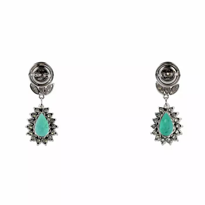 Boucles d`oreilles en or avec emeraudes et diamants. 