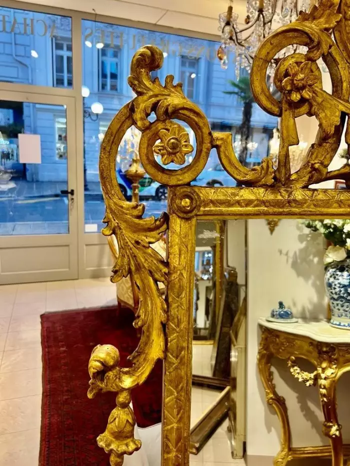 Rare 18th century gilded wood mirror, Italy