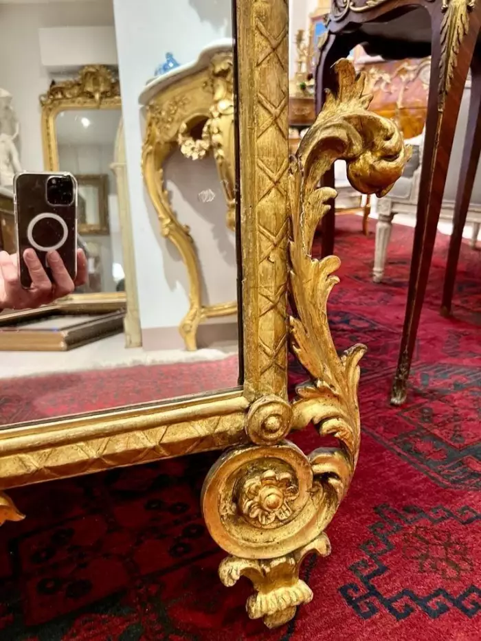 Rare 18th century gilded wood mirror, Italy