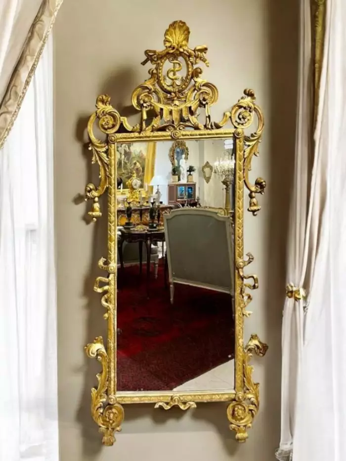 Rare 18th century gilded wood mirror, Italy