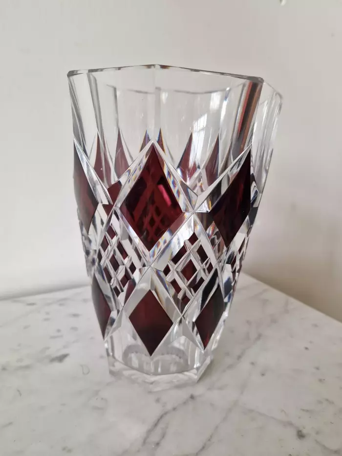 Bohemian crystal vase with bronze puti