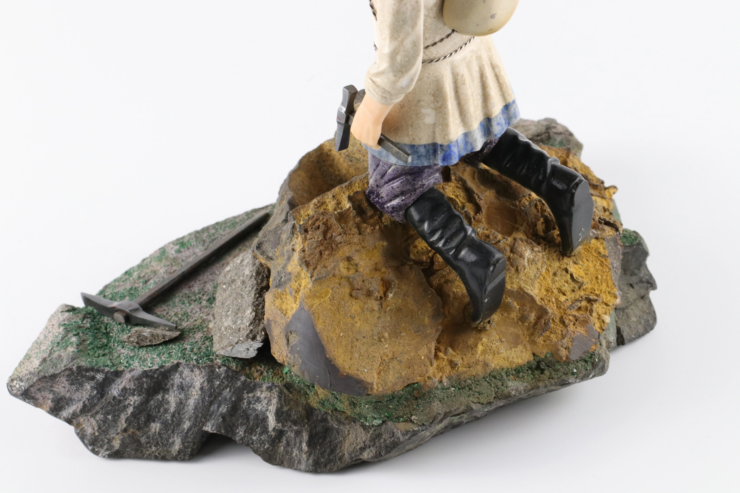 Stone-cut figurine Stone Seeker in Faberge style. 