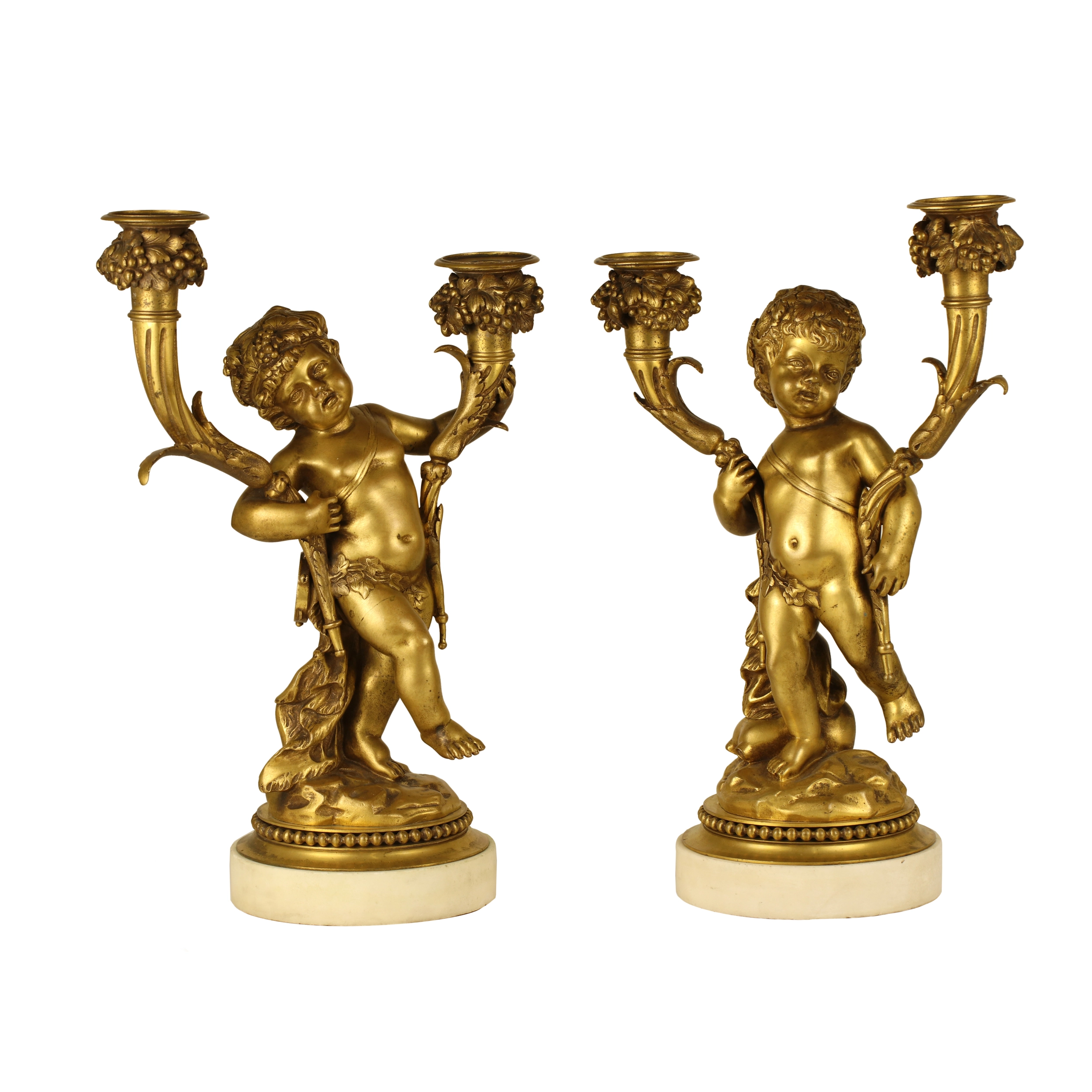 PAIRE DE CANDELABRES AUX FIGURES D’AMOURS FRANCE, SECONDE MOITIÉ DU XIXᵉ SIÈCLE