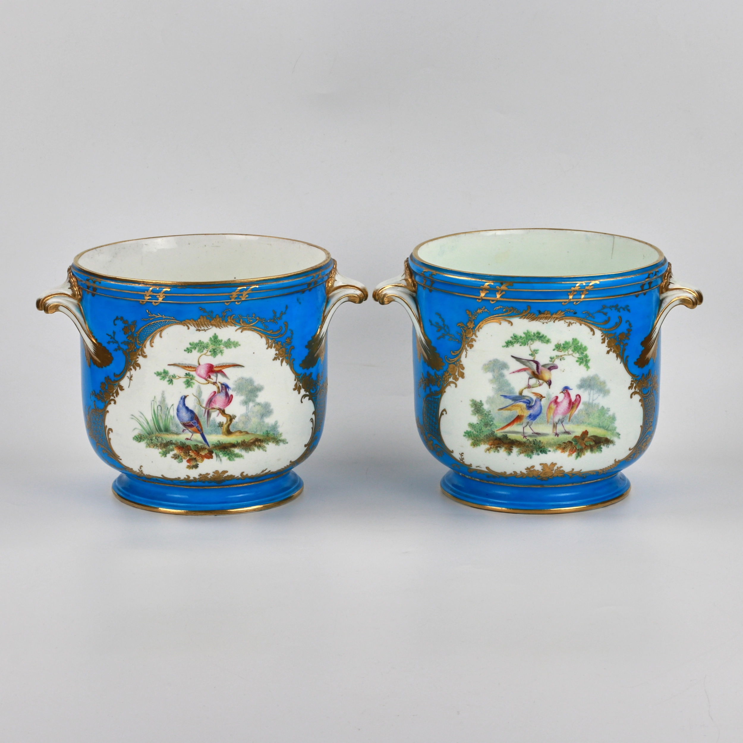A pair of Sevres cachepots